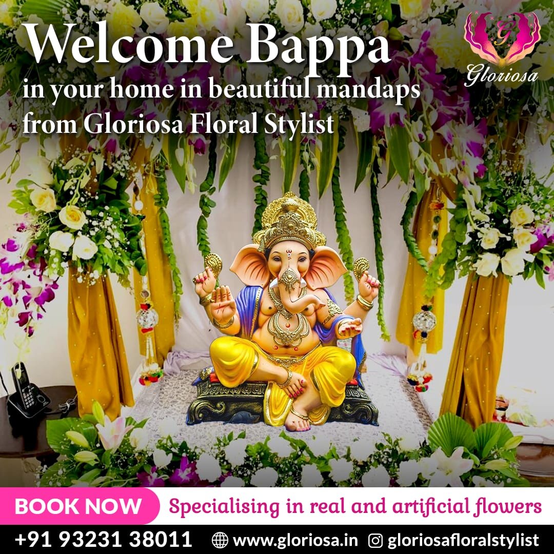 Traditional Ganpati makhar with marigold drapes and tuberose