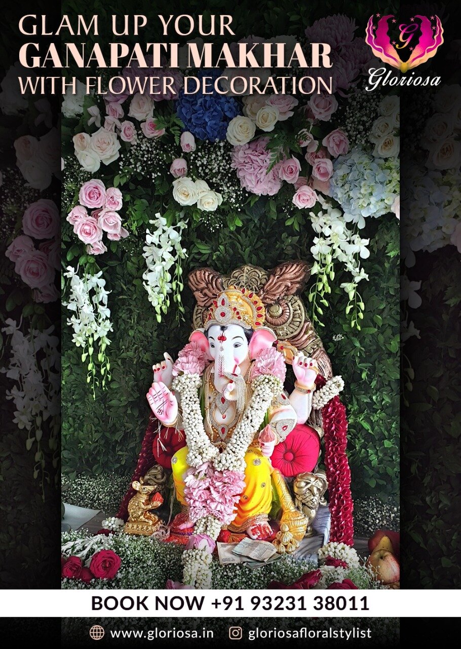 Ganpati makhar with roses baby breath and lush greenery