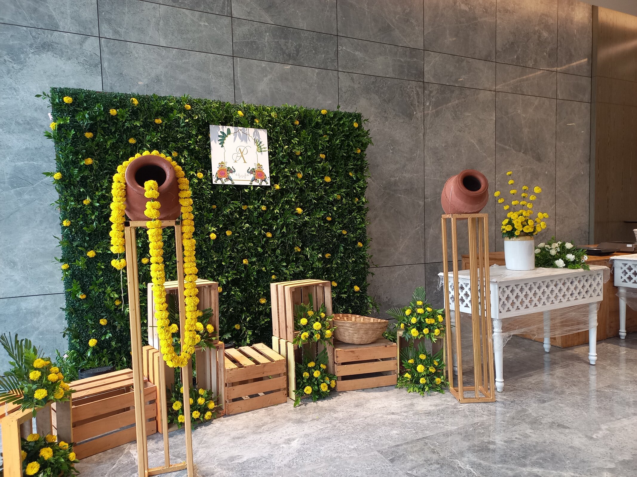 Elegant green wall garden setup with floral accents