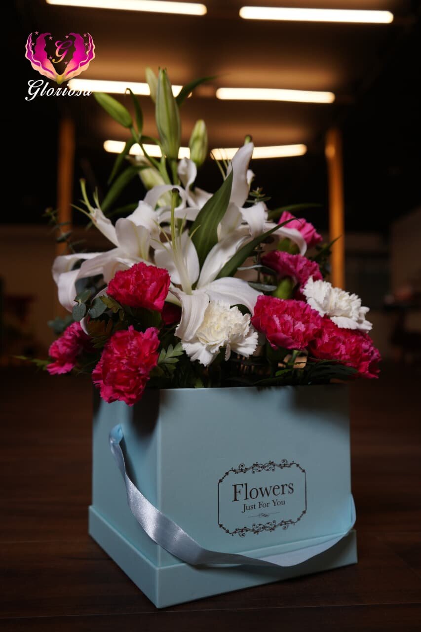 Lilies and carnations in Gloriosa branded designer box