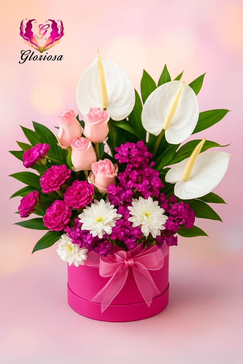 Luxury pink anthurium and roses in fuchsia hat box