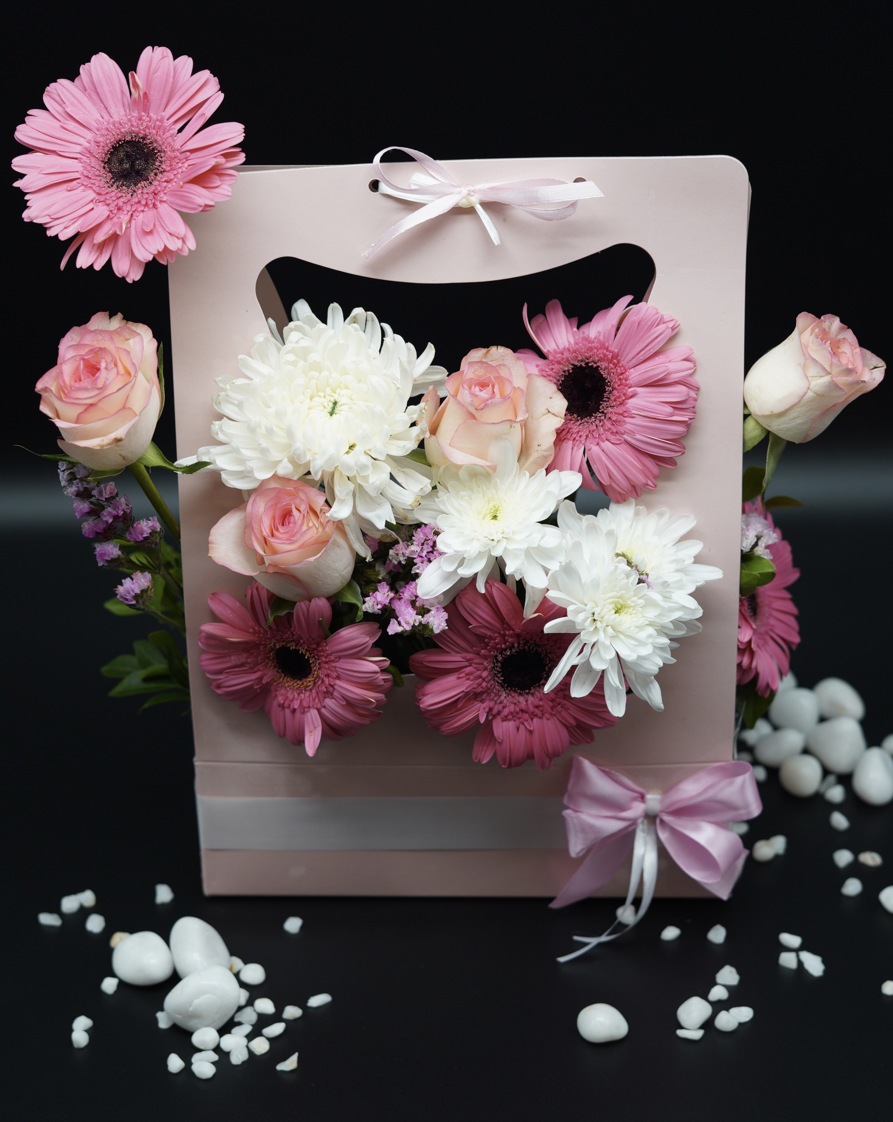 Pink floral gift hamper with gerberas and roses